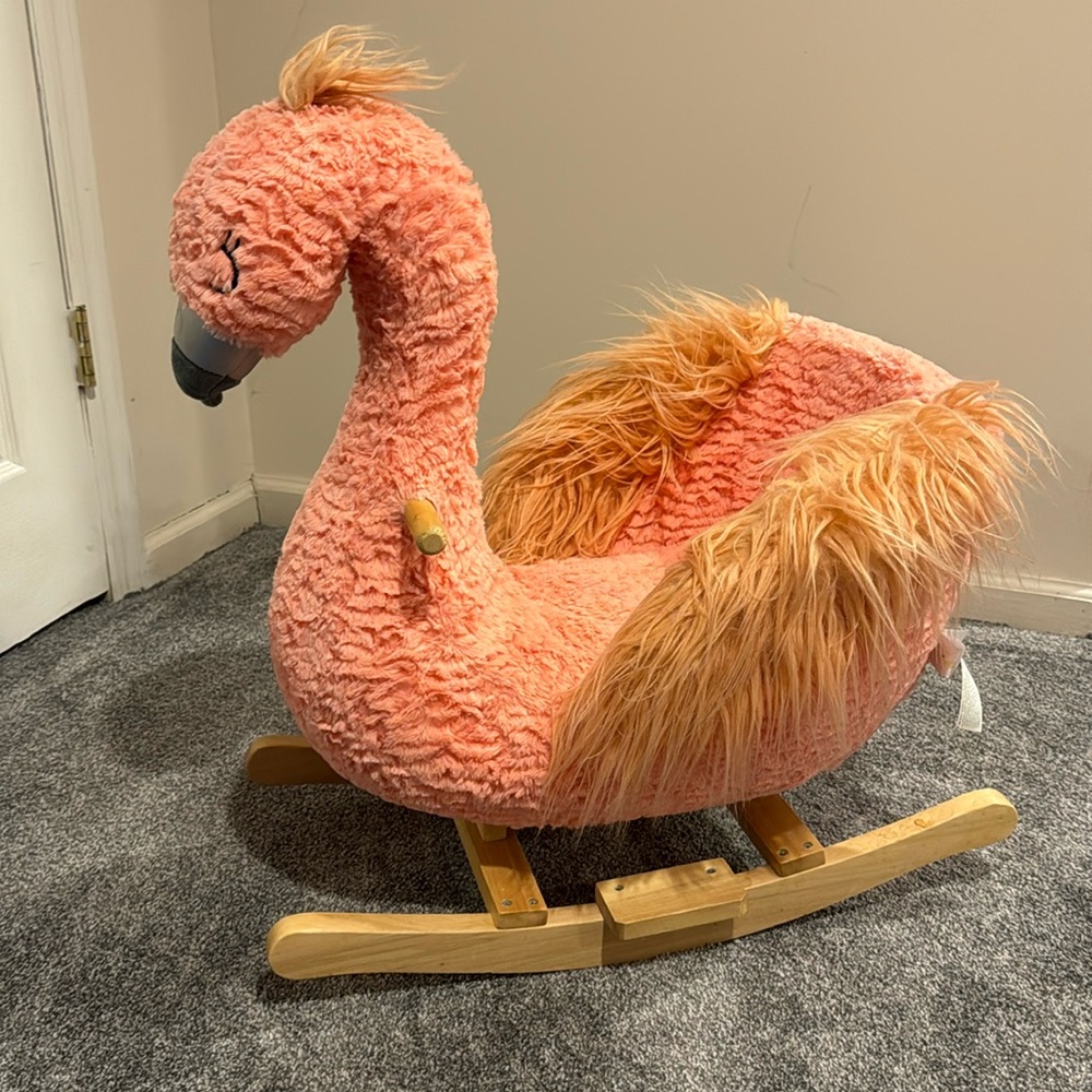 Pink flamingo sit and rock in chair